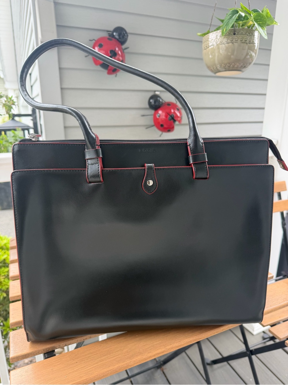 LODIS Audrey black leather briefcase/laptop tote with red trim